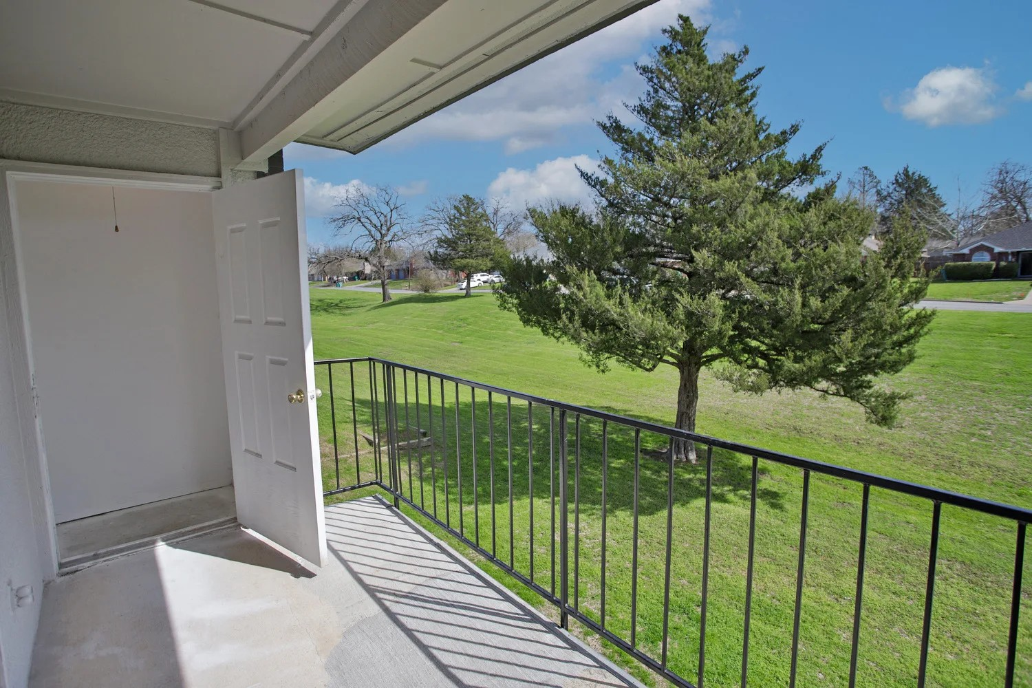 a view from inside a fence of a building